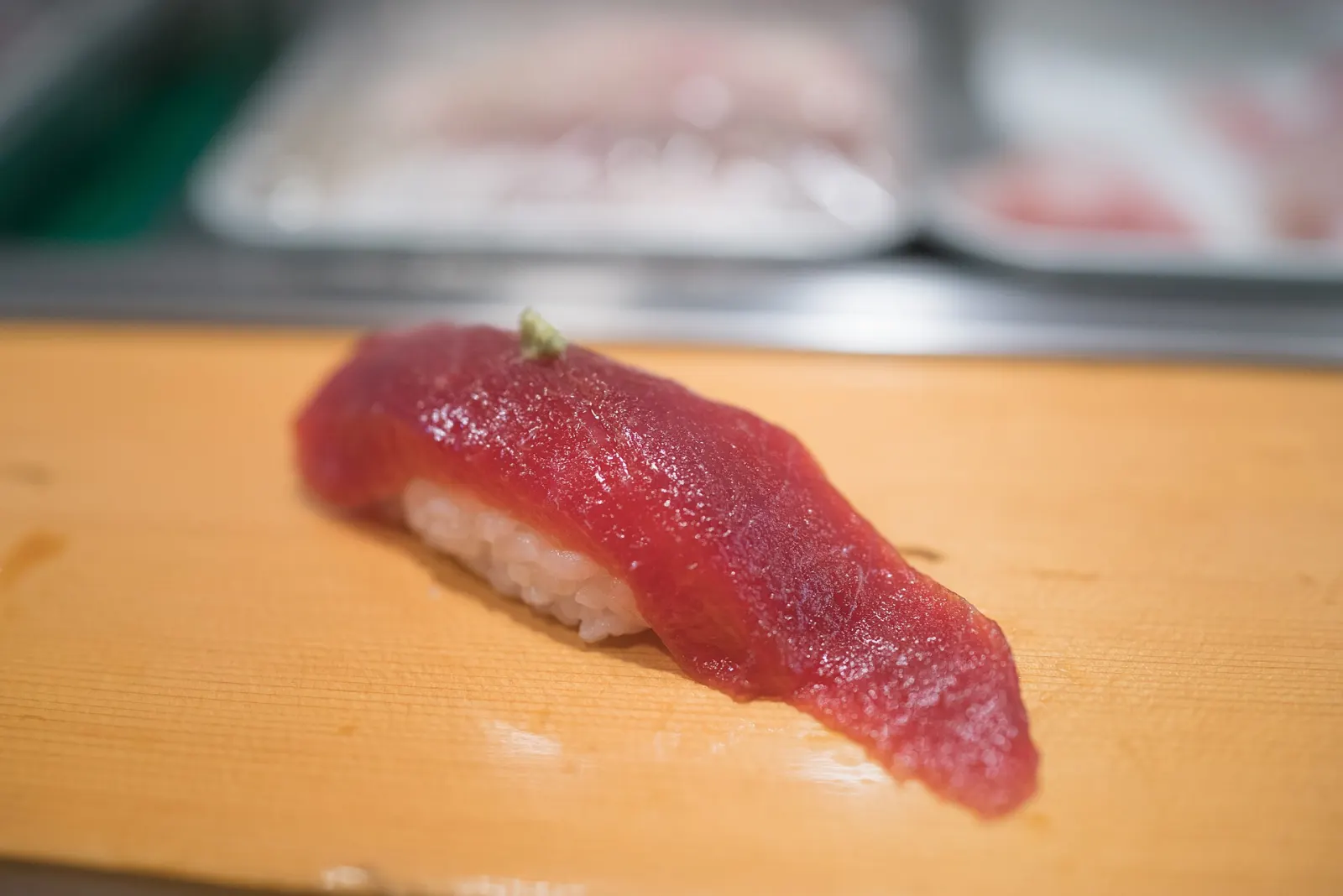 Lean tuna nigiri set down on the counter