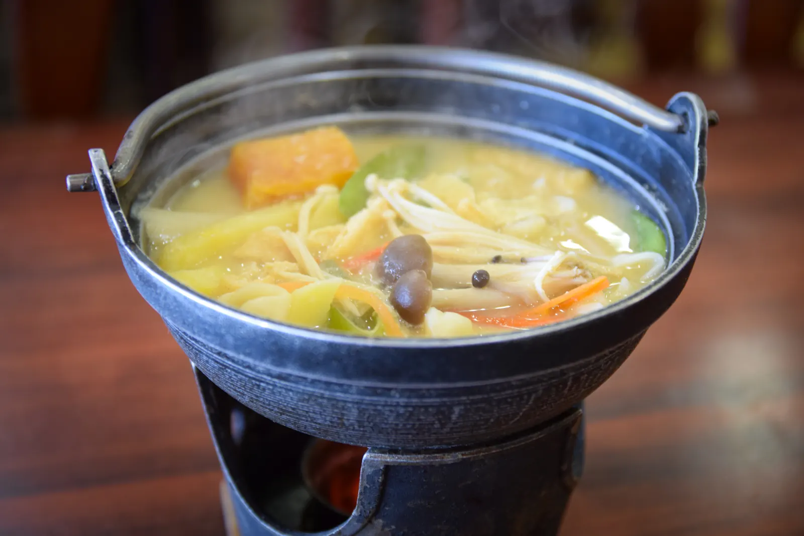 Hoto simmering in its iron pot