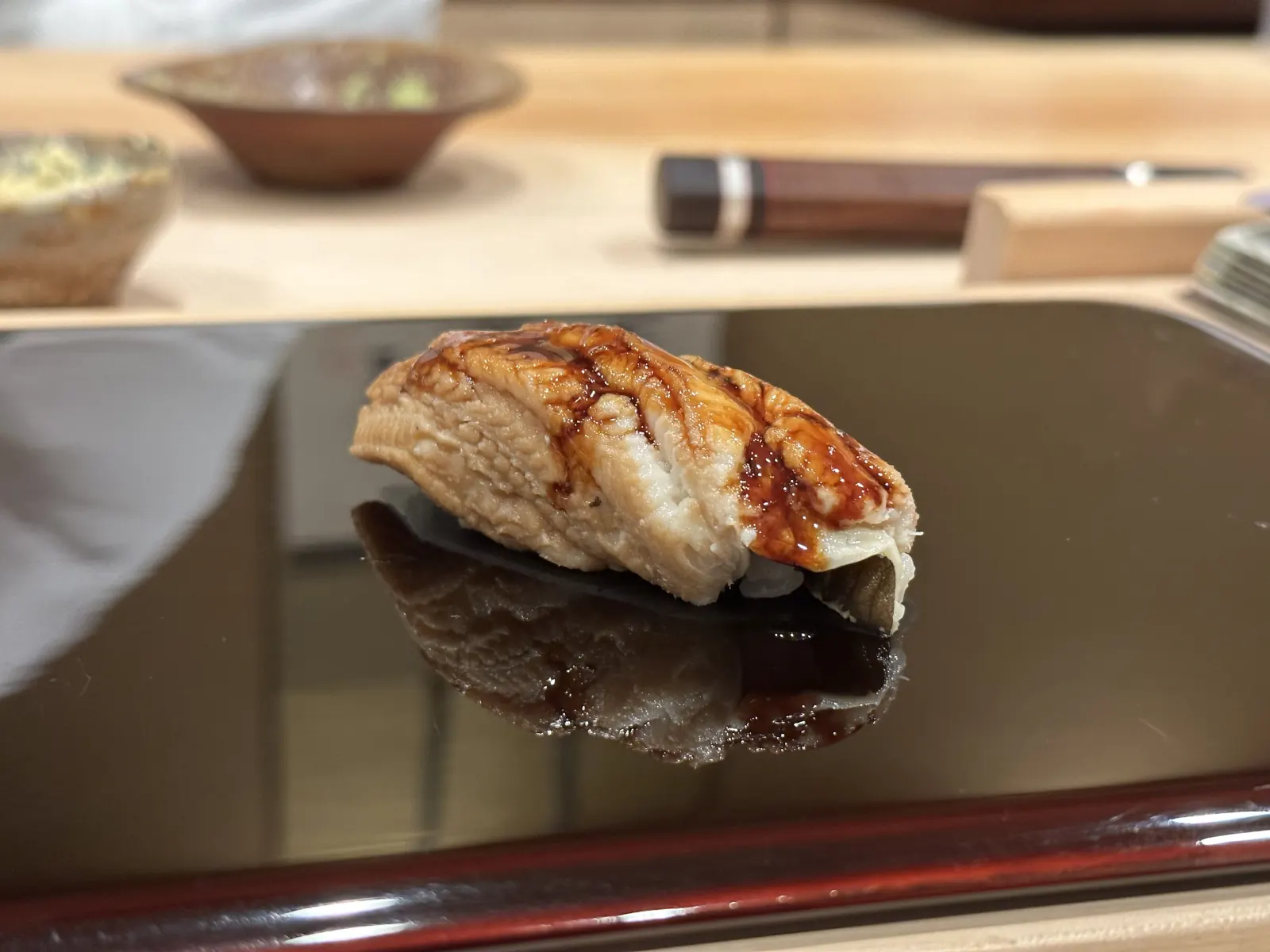 Anago nigiri, brushed with sweet sauce