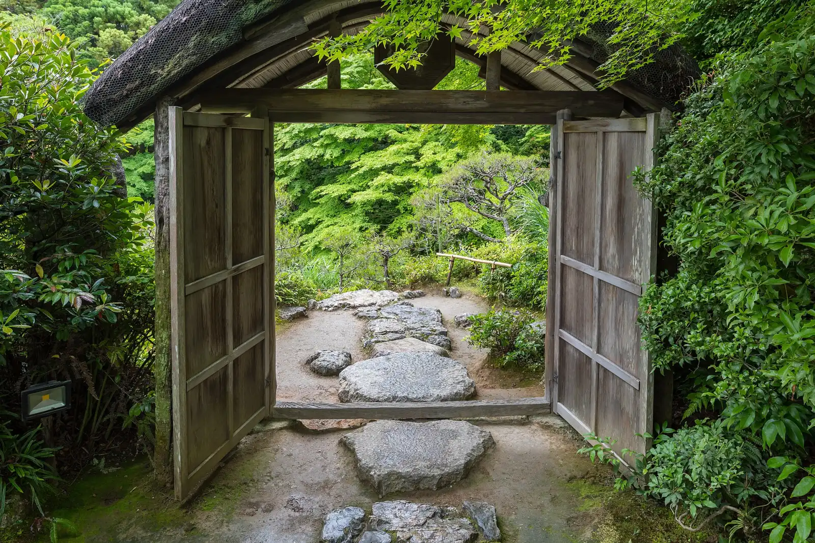 A wooden gate into Okochi Sanso's garden