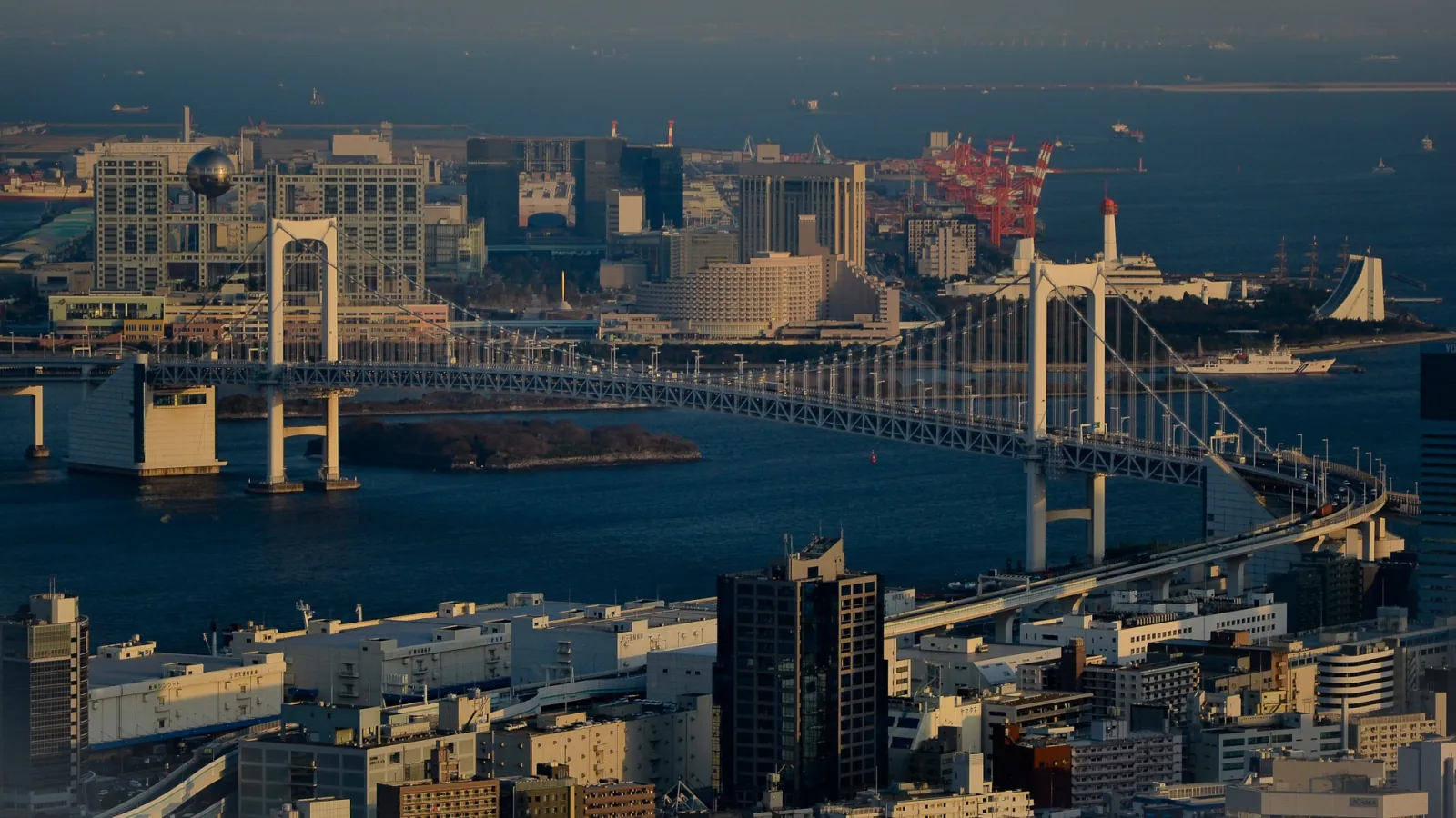 Rainbow Bridge and its loop ramp, seen from the air