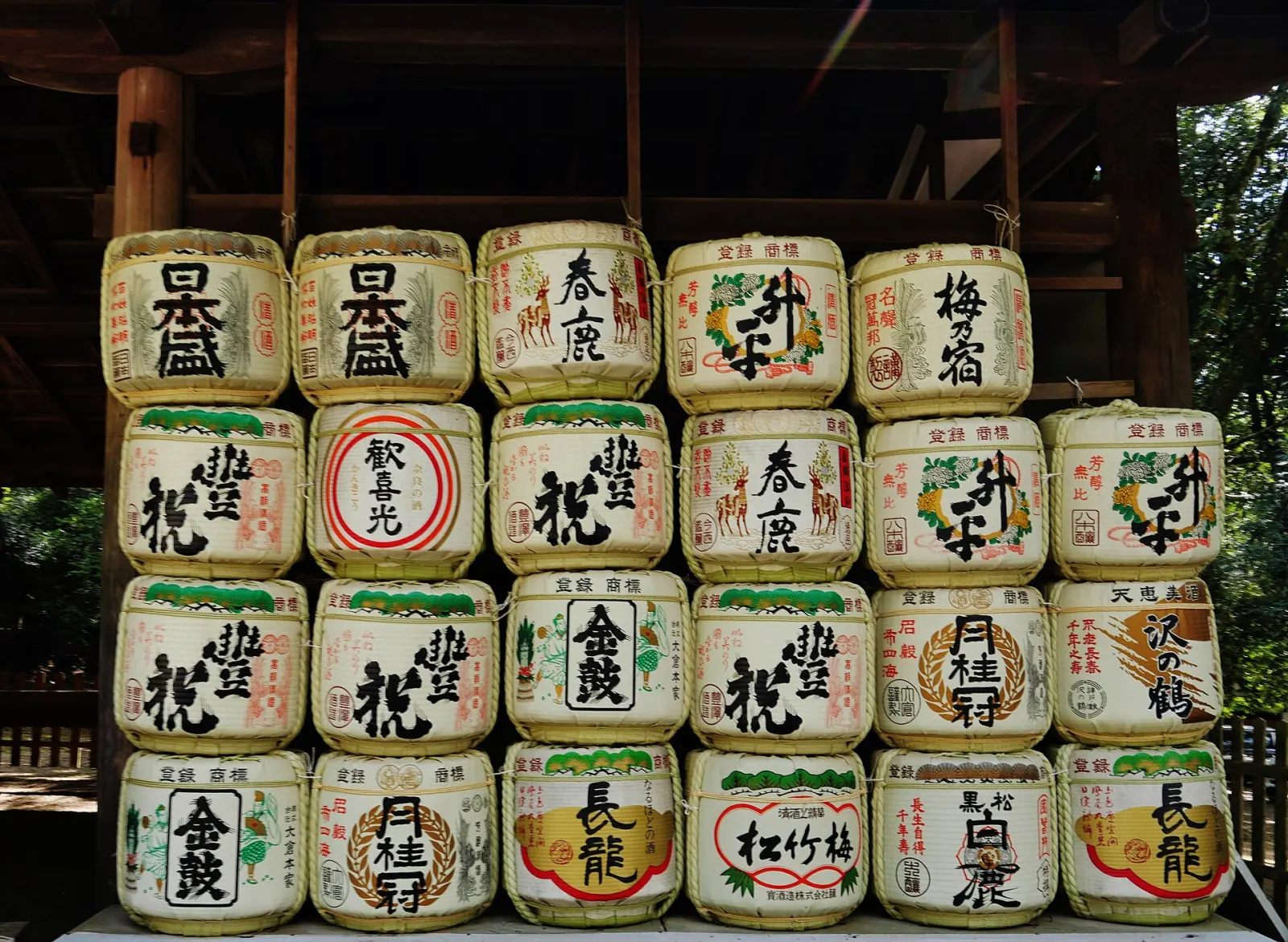 Painted sake barrels stacked as a shrine offering