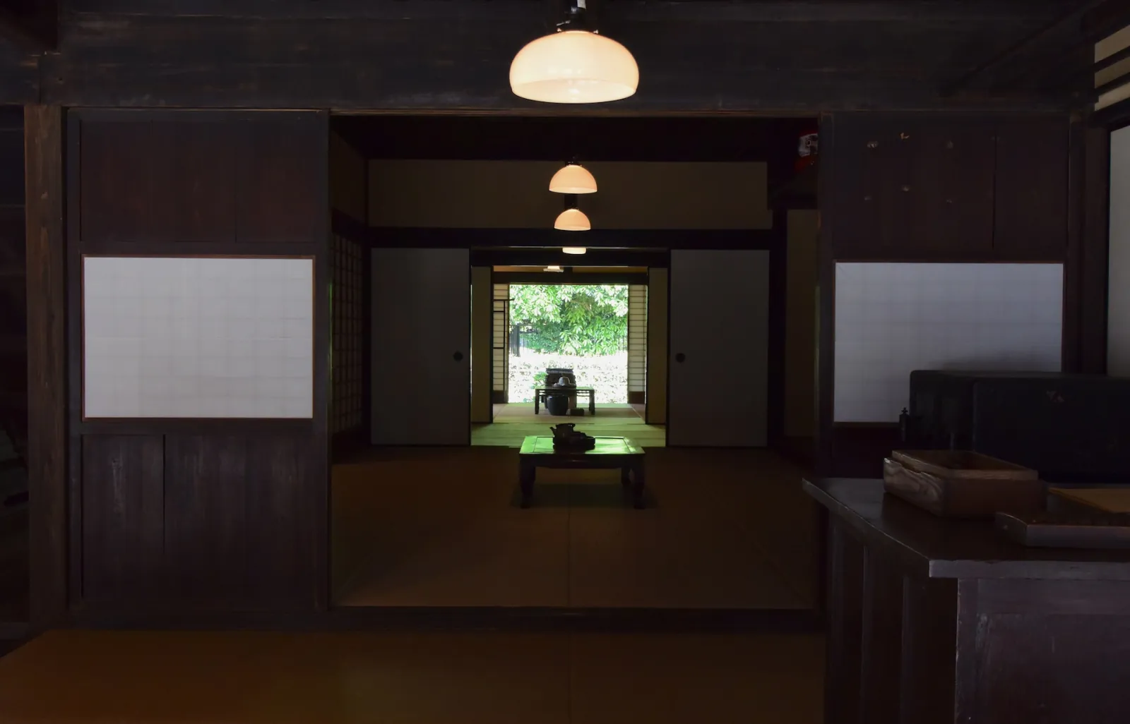 Tatami rooms opening onto a garden, in an old inn
